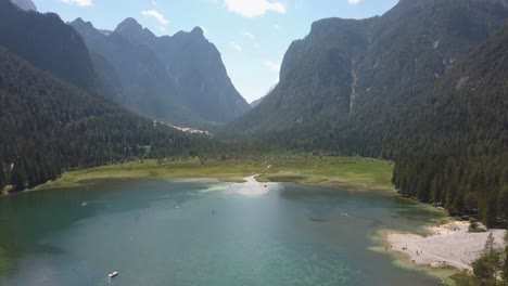 aerial of toblacher lake- lago di dobbiaca in the alps in europe, italy dolomites