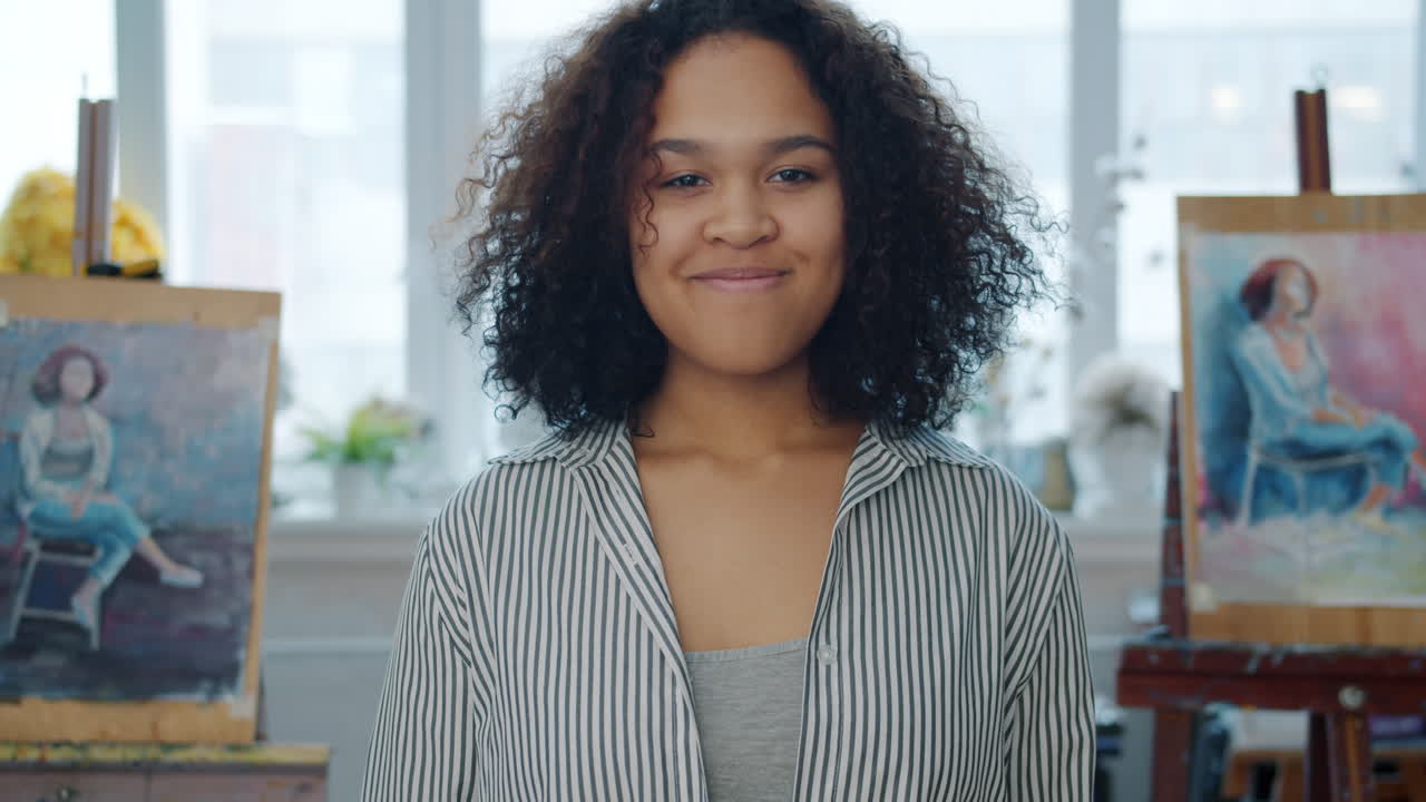 Young Woman Artist in a Painting Studio
