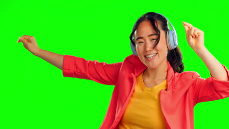 Headphones,-green-screen-and-woman-dancing