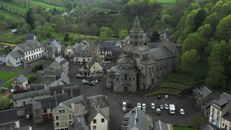 Dramatic-beautiful-Romanesque-style-church-nestled-in-a-vibrant-green-valley