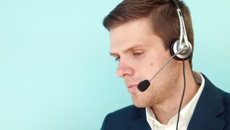 a man in a headset working in customer service