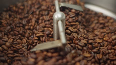 Cooling-tbeans-is-a-fundamental-part-of-coffee-roasting-process,-stopping-roasting-and-sealing-in-flavors