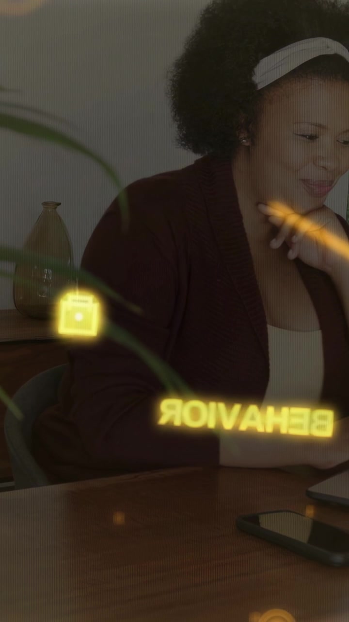Vertical video: Woman tapping phone at desk, initiating tech HUD sliding, highlighting signature