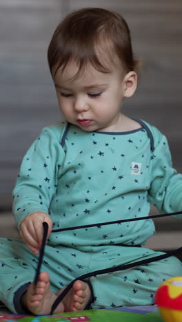 beautiful funny infant child. portrait of cute little boy. vertical video