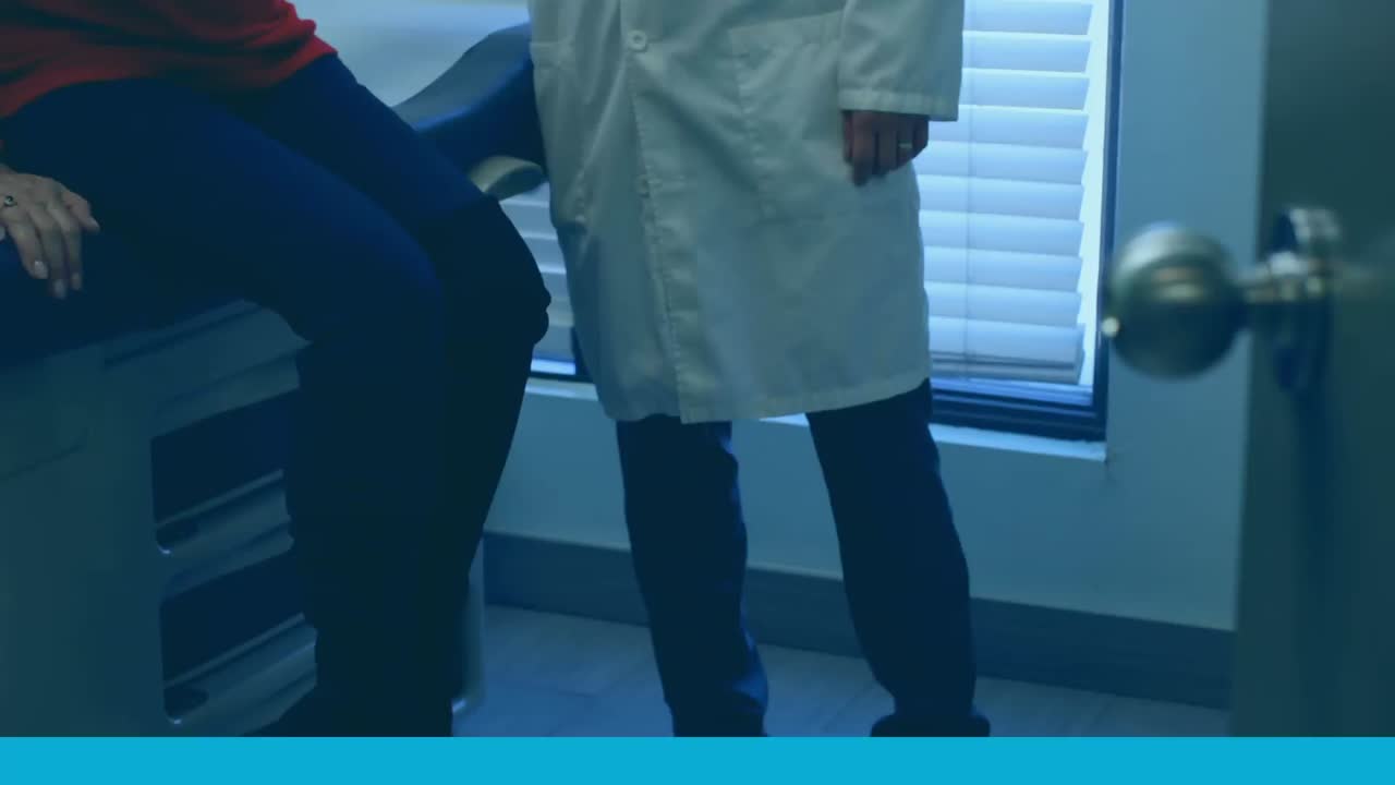 Molecule structure moving against male doctor treating senior patient