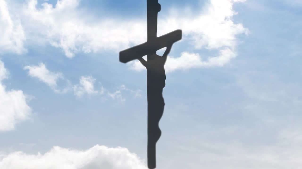 Crucifix silhouette staying centered while clouds drifting and shifting light, highlighting form
