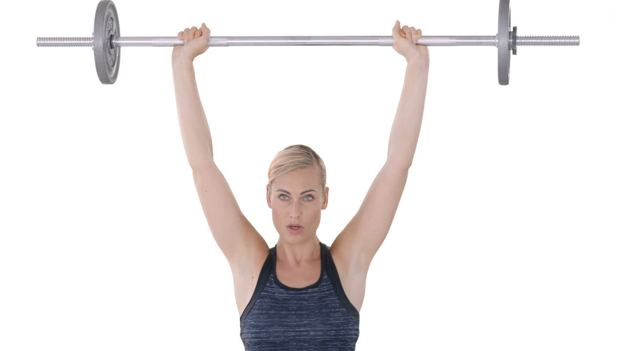 Woman lifting dumbbell weights 