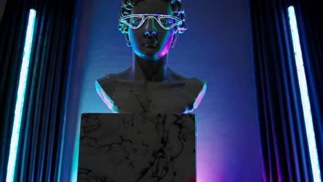 busto antiguo con gafas de neón