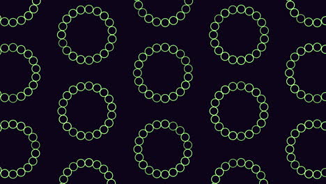 Neon futuristic circles pattern with rainbow rings on black gradient