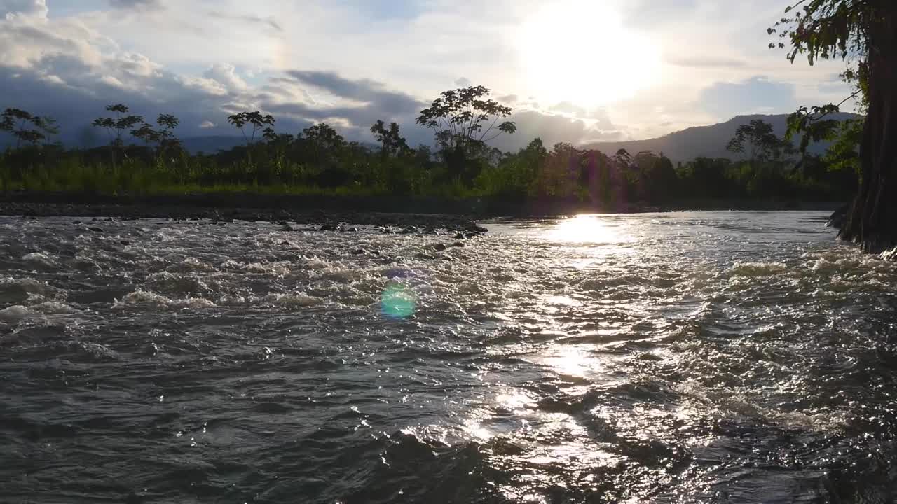 Sunet at the river in Peru