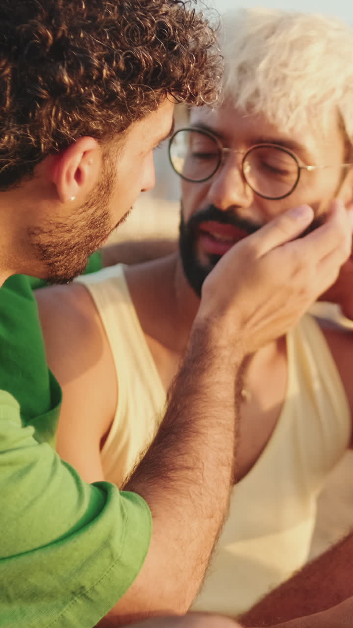 Close-up of Two Men Sharing an Intimate Moment Outdoors