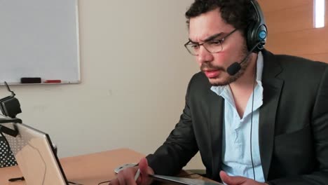 man reviewing analytics on tablet: virtual session