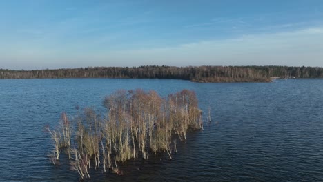 small island submerged in lake karujärv due to high water levels in saaremaa, estonia.