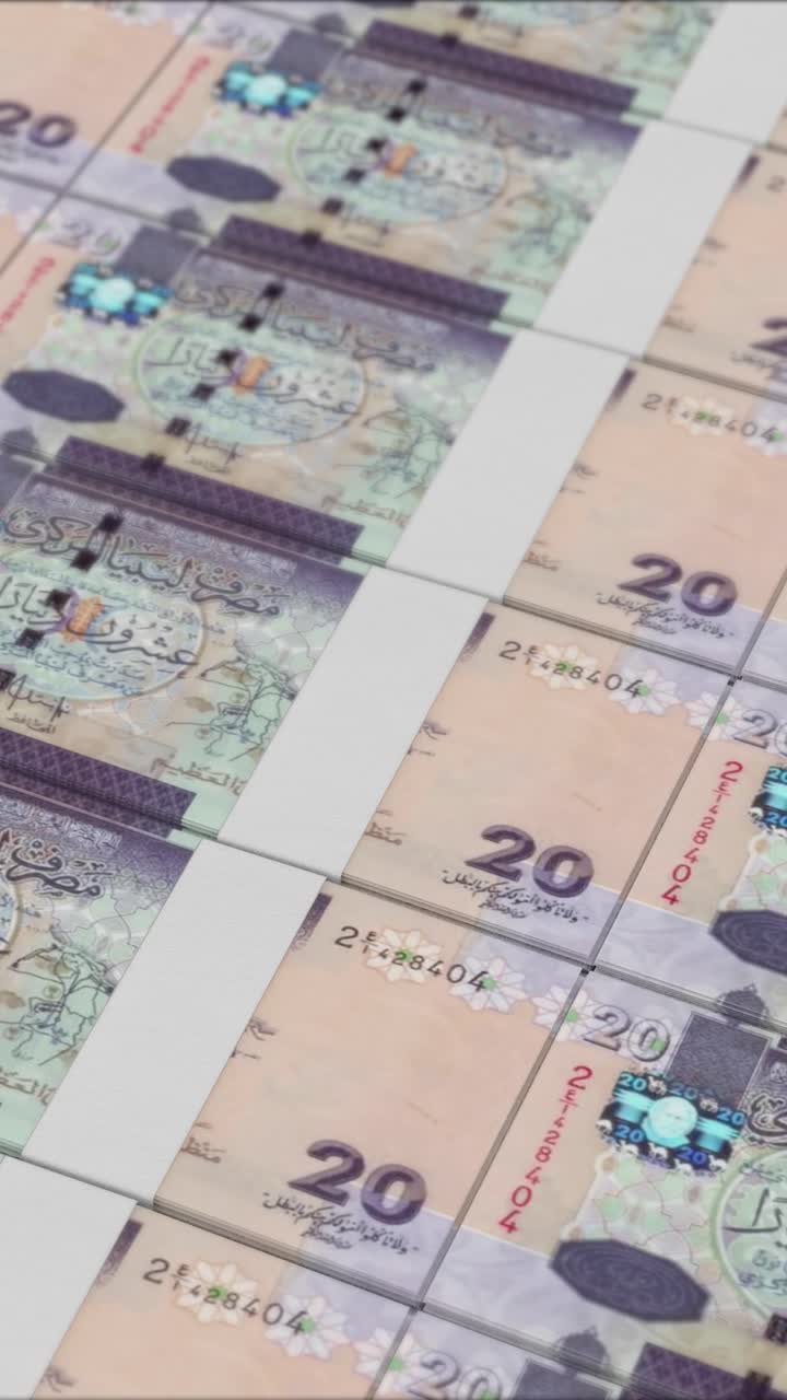 video vertical de billetes de 20 dinares libios impresos por una prensa de dinero