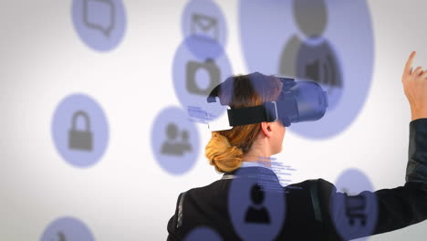 multiple digital icons over rear view of businesswoman wearing vr headset against white background