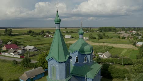 wonderful view of saint intercession cathedral with glorious trees and houses in ukraine - aerial shot