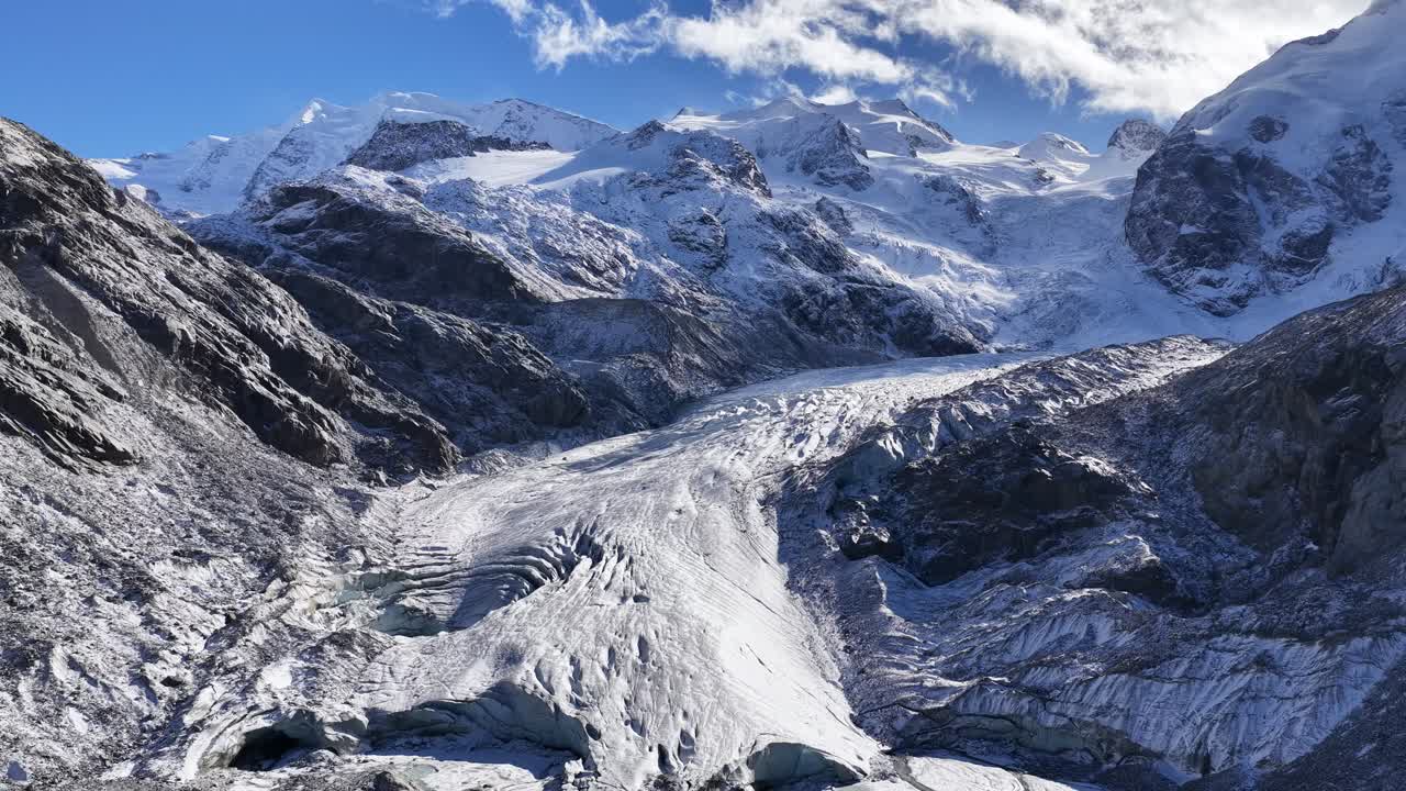 Glacier and snowy mountains in Engadin seen by drone