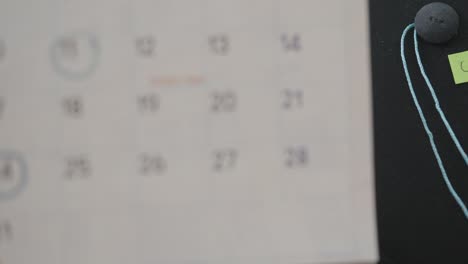 graduation cap on a paper calendar countdown planning for graduation day