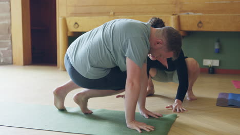 People doing yoga indoors