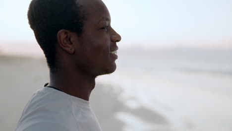 runner, fitness or happy man on beach to relax