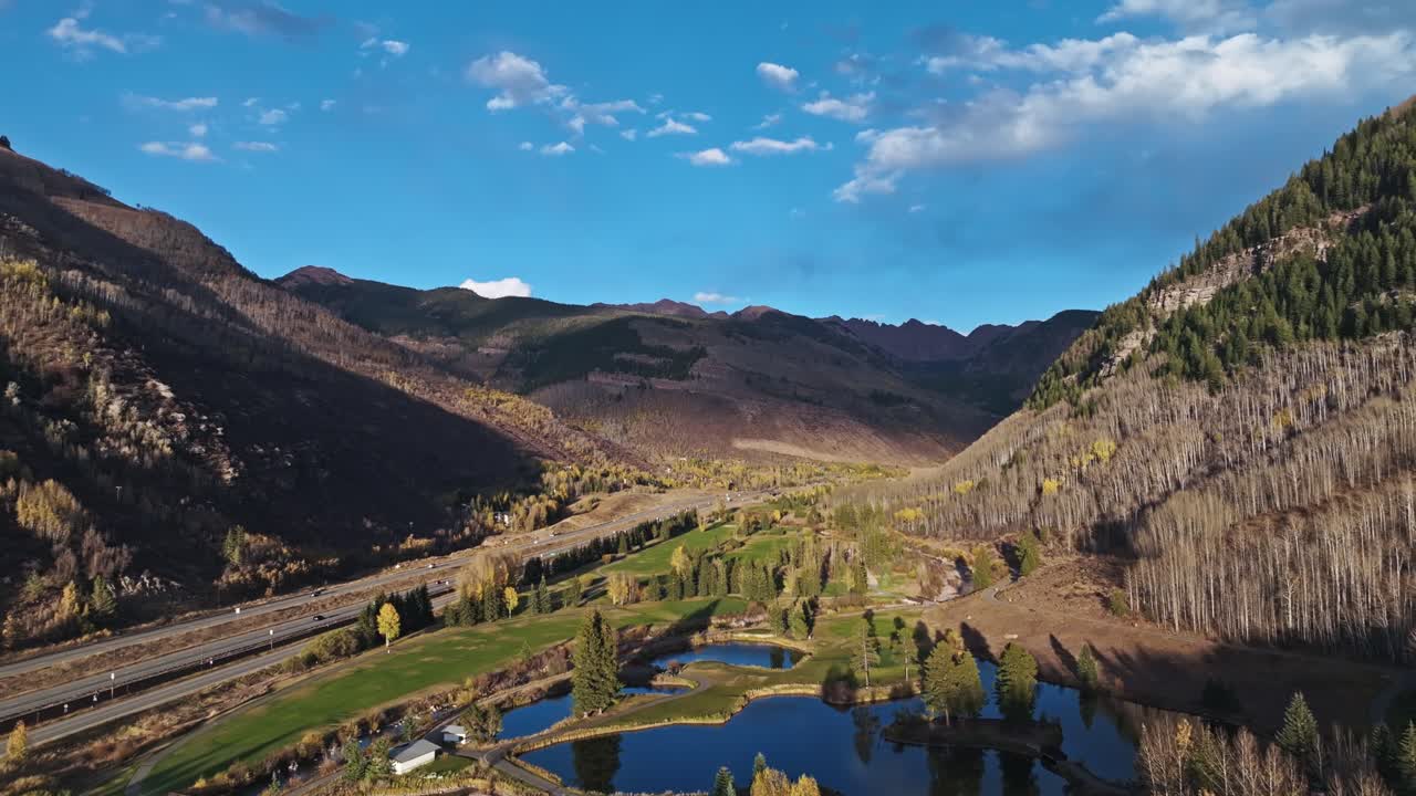 Aerial View of a Mountain Valley in Autumn
