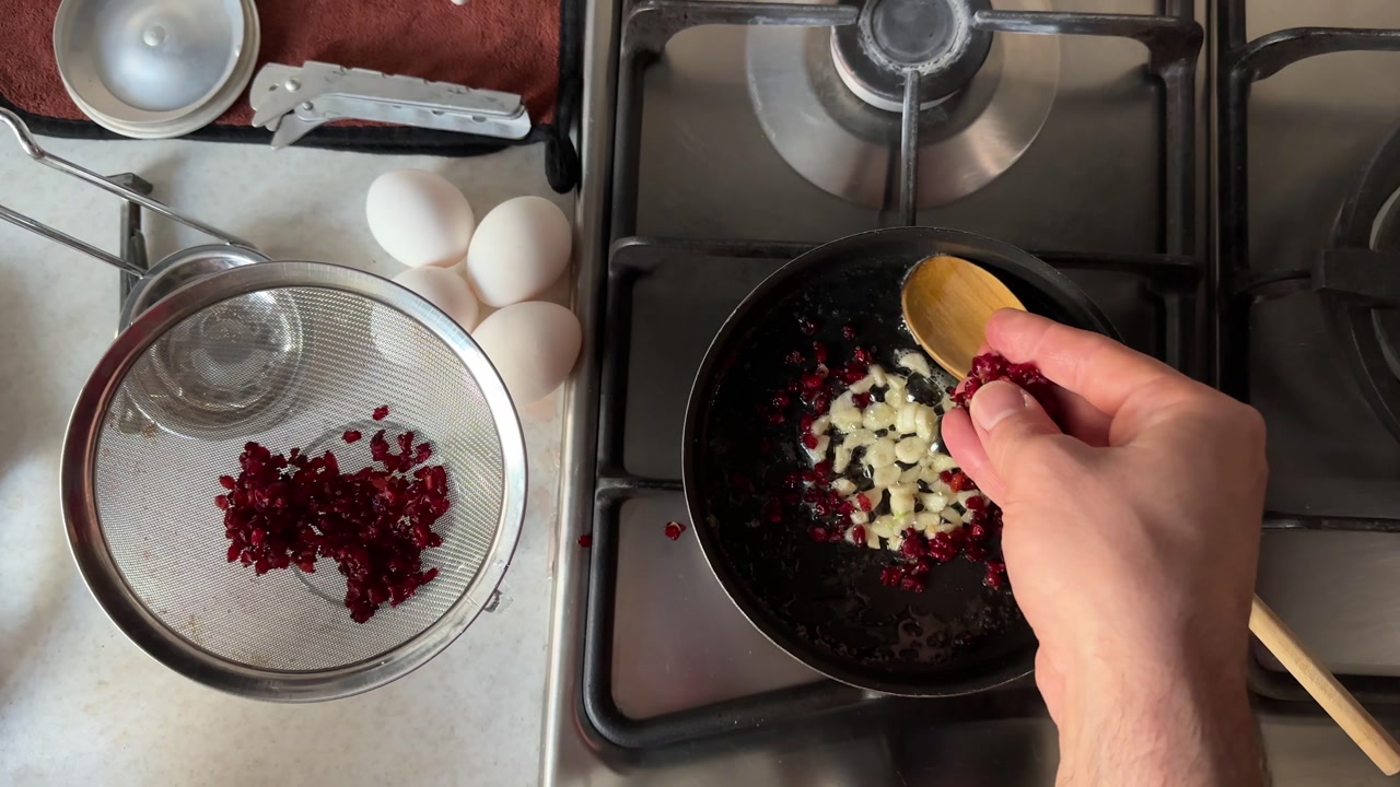 fried barberries with egg omelet food prep persian breakfast turkish kahvalti melt butter frying pan hot stove fire garlic oven kitchen delicious iranian cooking lifestyle local taste gourmet recipe