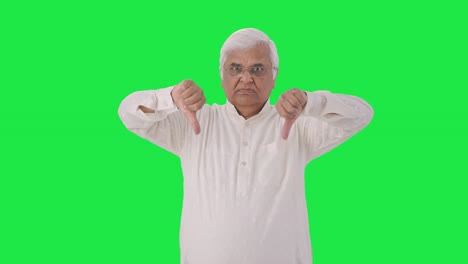 Angry-Indian-old-man-showing-thumbs-down-Green-screen