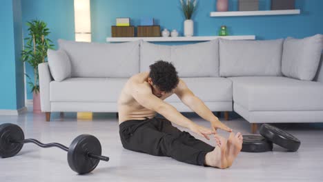 Young-athlete-man-exercising-at-home.-Healthy-lifestyle.