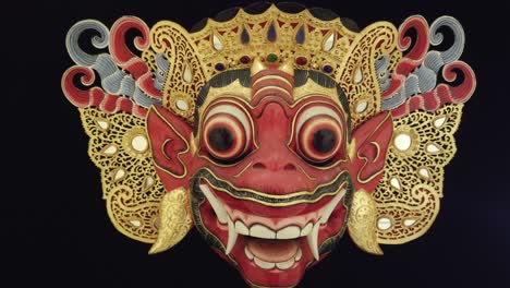 Red-Monkey-Topeng-Mask,-Wood-Carving-of-Bali-Indonesia,-Art-and-Cultural-Theater-Black-Infinite-Background,-Asia