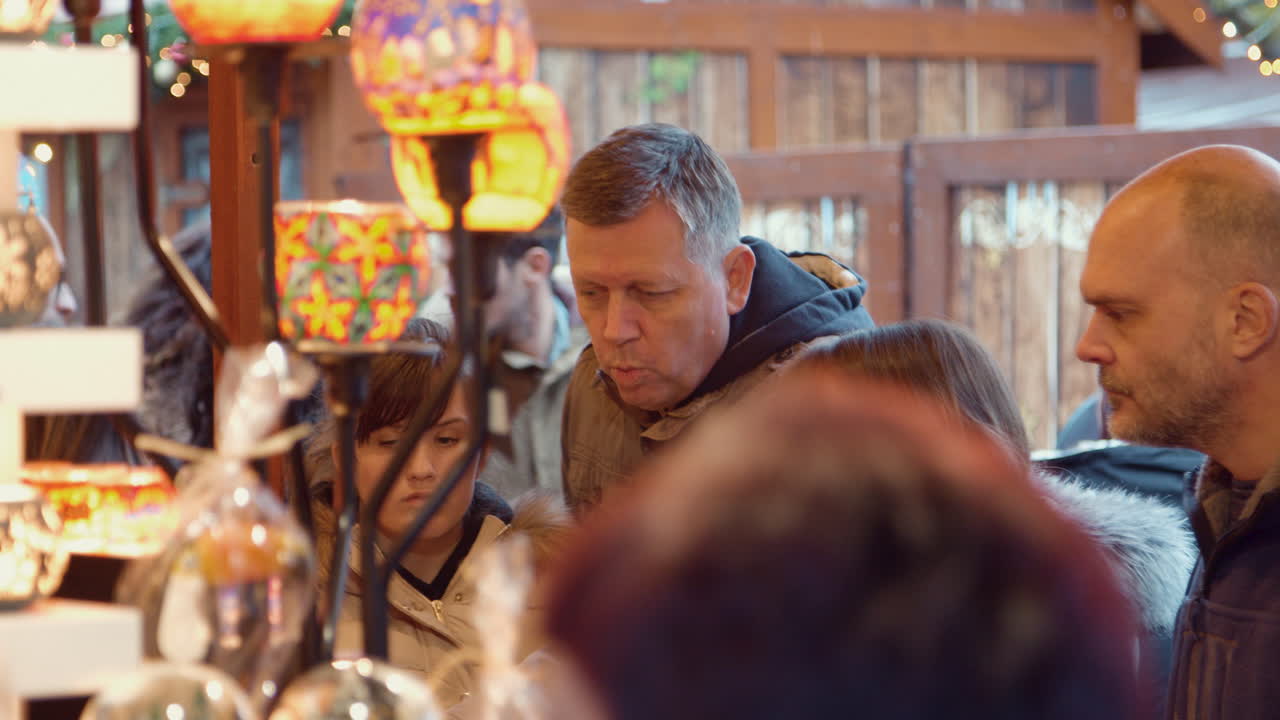 Family discuss with hand crafted presented to buy as a gift for a loved one