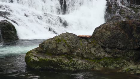 cascading water down dougan falls in late autumn, tight pan up