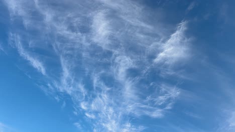 cirrus clouds over cape town, south africa on an autumn afternoon.