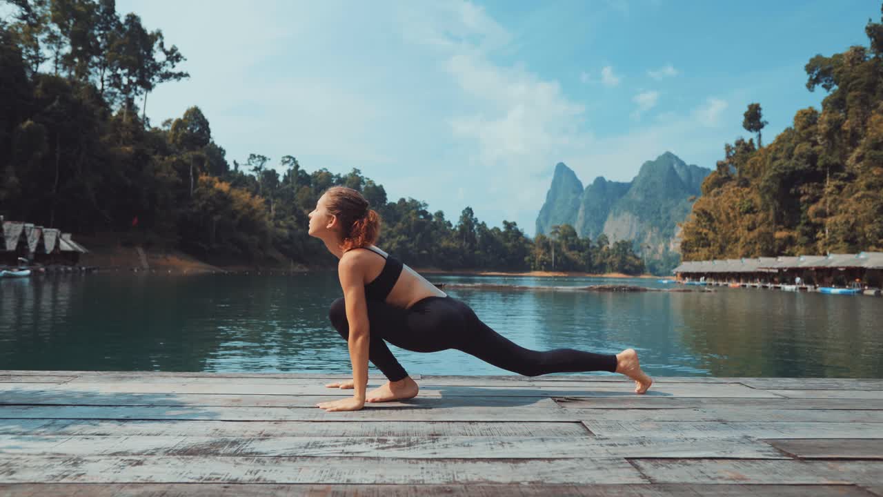 Yoga poses by a lake