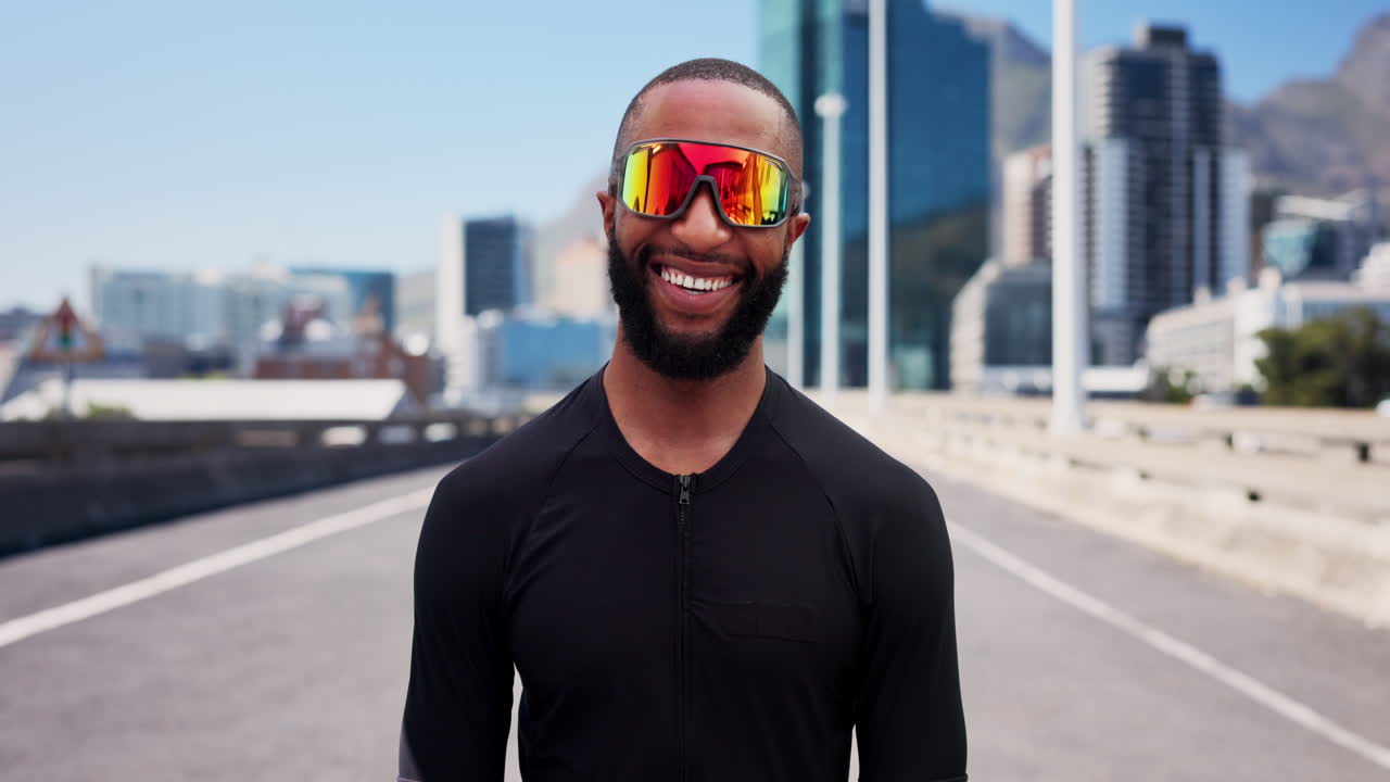 Happy Athlete Man in Reflective Sunglasses Standing on City Road