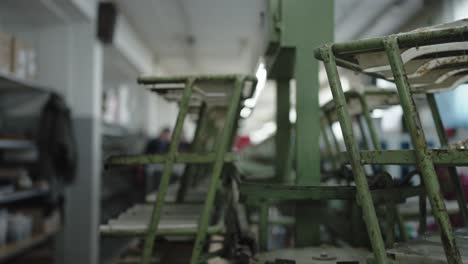 machine action on a shoemaking factory line