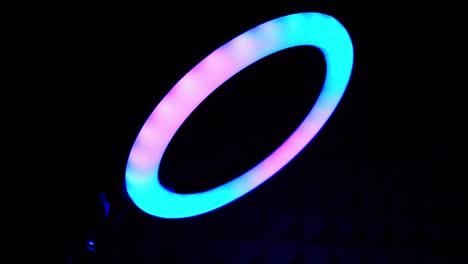 the ring rgb lamp flickers turquoise and lilac. multicolored light.