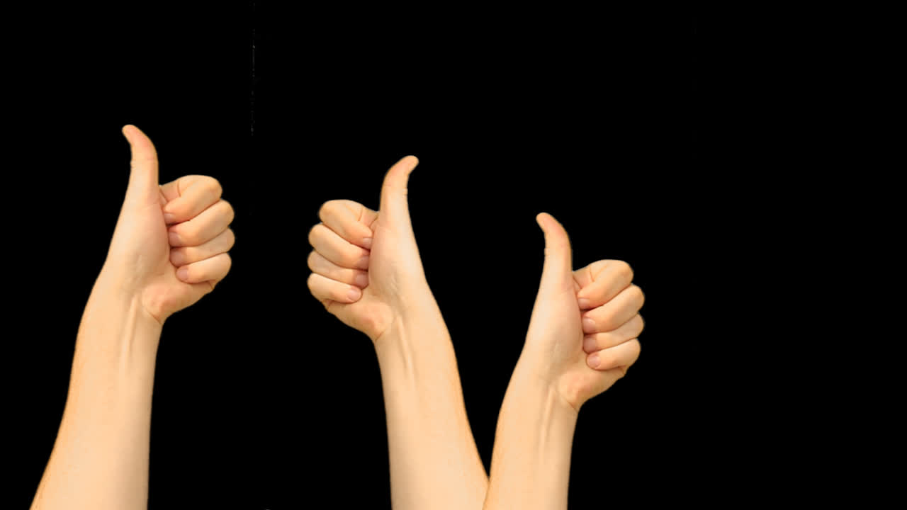 Multiple Hands Showing Thumbs Up Gesture on Black Background