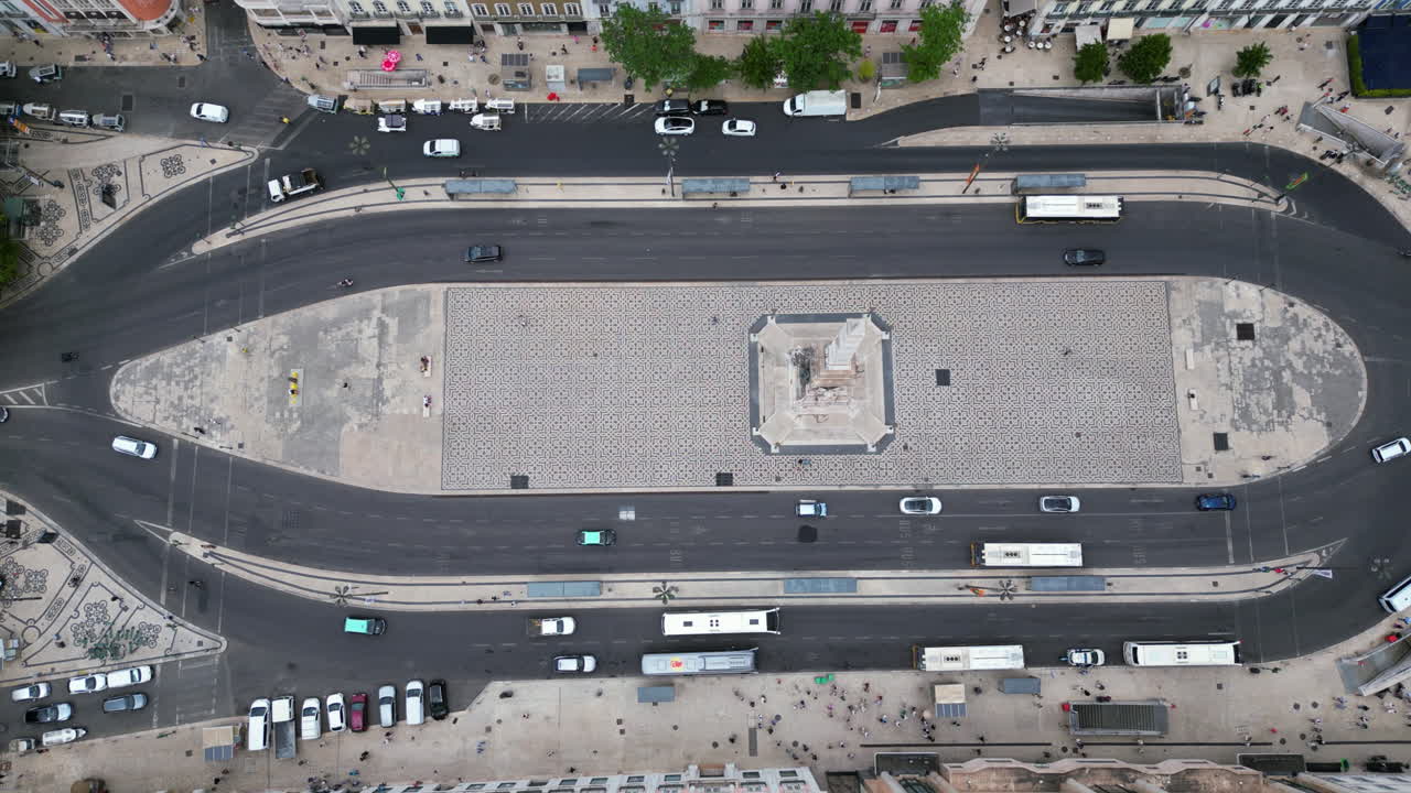 Birds eye drone shot of the Obelisk of Restauradores at Liberdade avenue, Lisbon