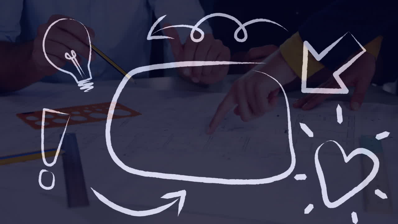 Pointing hands at plans with animation doodles, including arrows and symbols