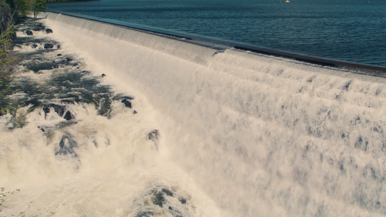 medium shot of new croton reservoir, stepped spillway, and gorge. Slow motion 40fps. static