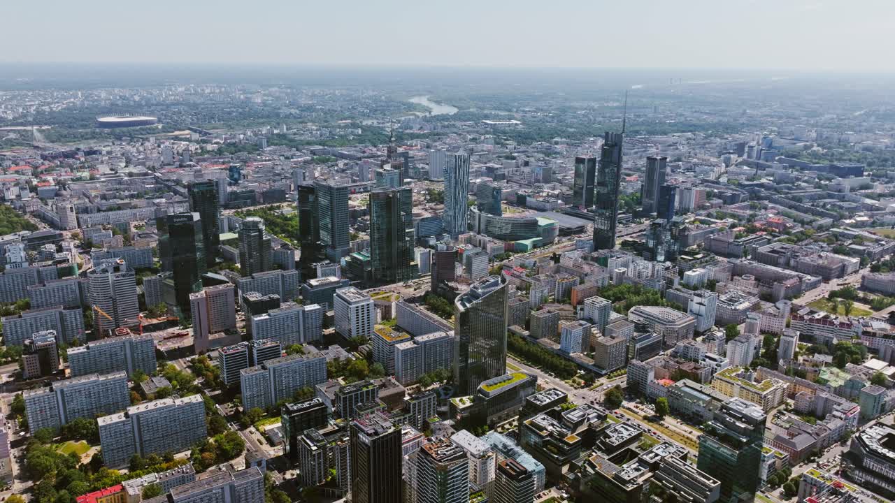 Aerial Warsaw cityscape in drone motion, concept of drone threats, civil defense