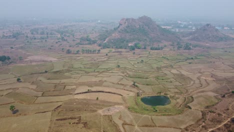 Drone-video-shot-of-vast-area-after-harvesting-in-plateau-region