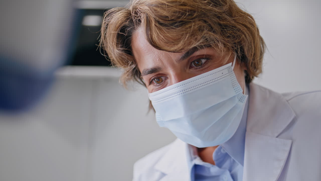 Closeup dentist examining patient dental health in stomatology clinic closeup