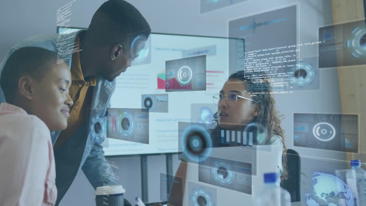 Diverse team collaborating in office with digital data processing animation overlay
