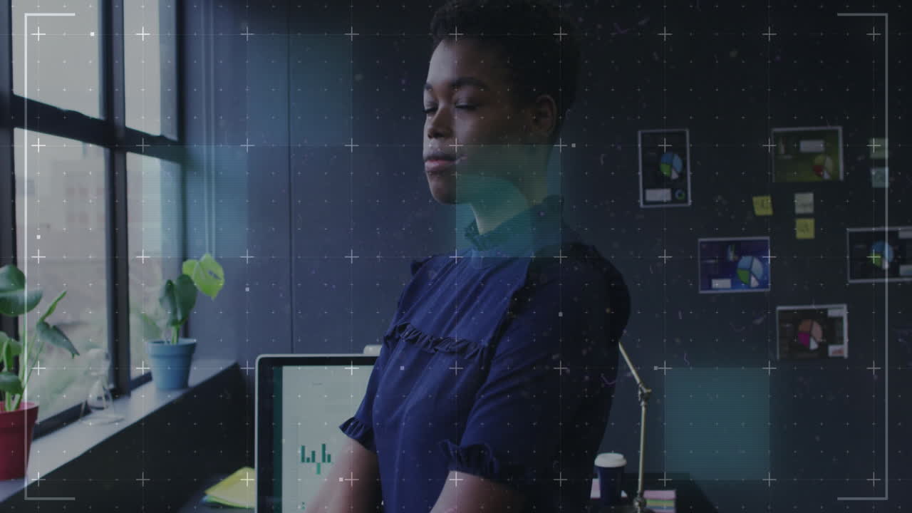 Animation of data processing over african american businesswoman in office