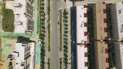 Bird-eye-aerial-over-residential-area-with-apartments,-urban-landscape-in-Huayin,-a-city-nestled-in-the-heart-of-Shaanxi-Province,-China