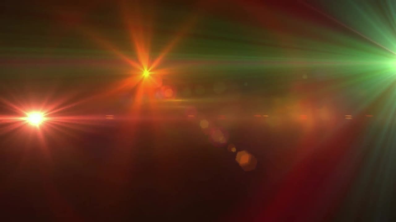 animación digital de múltiples puntos de luz coloridos que se mueven contra un fondo oscuro