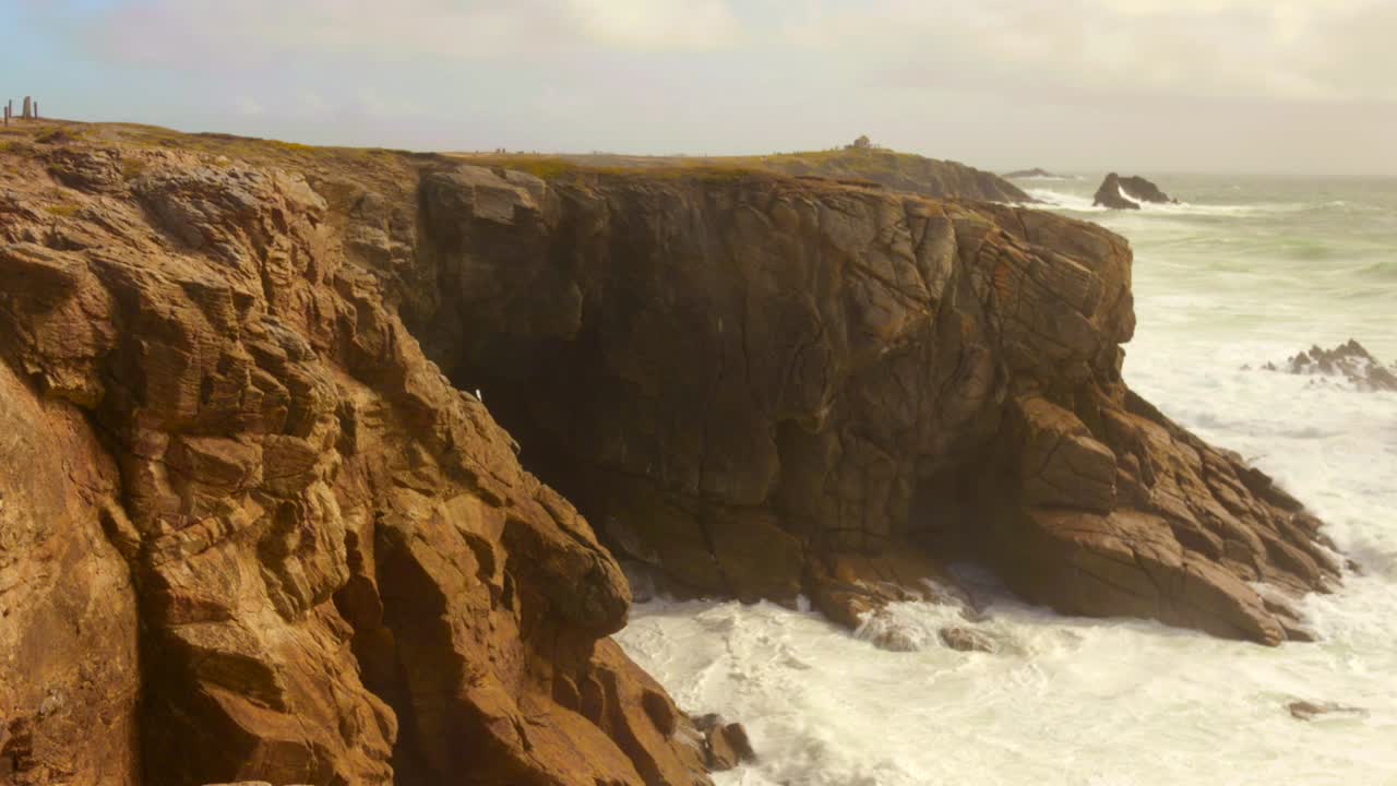 Scenic wide shot capturing the unique landscape and rugged coastal beauty of the Quiberon Peninsula in the Morbihan region of Brittany, France, overlooking the Atlantic Ocean