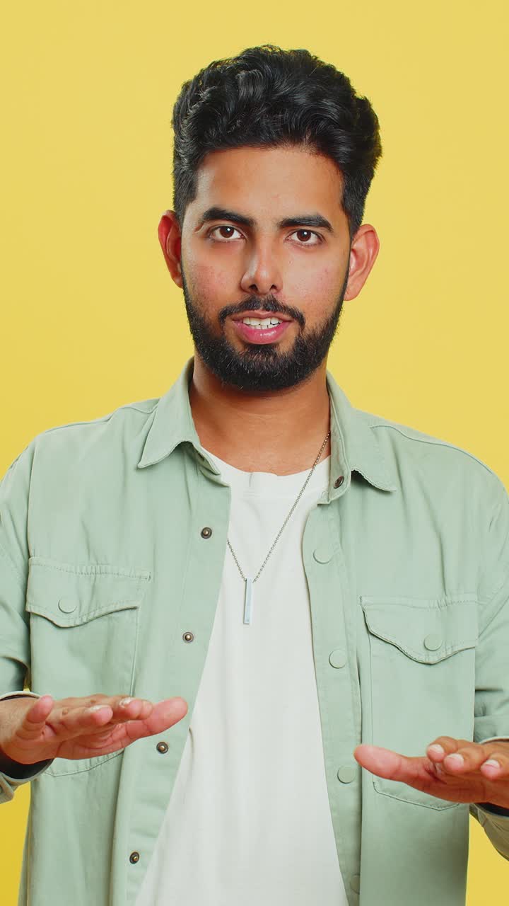 Strict indian man warning hands gesture saying no be careful advice to avoid danger caution
