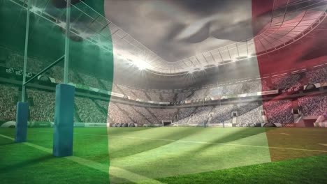 Estadio-Lleno-De-Aficionados-Con-Una-Bandera-Italiana-Animada-En-Primer-Plano.